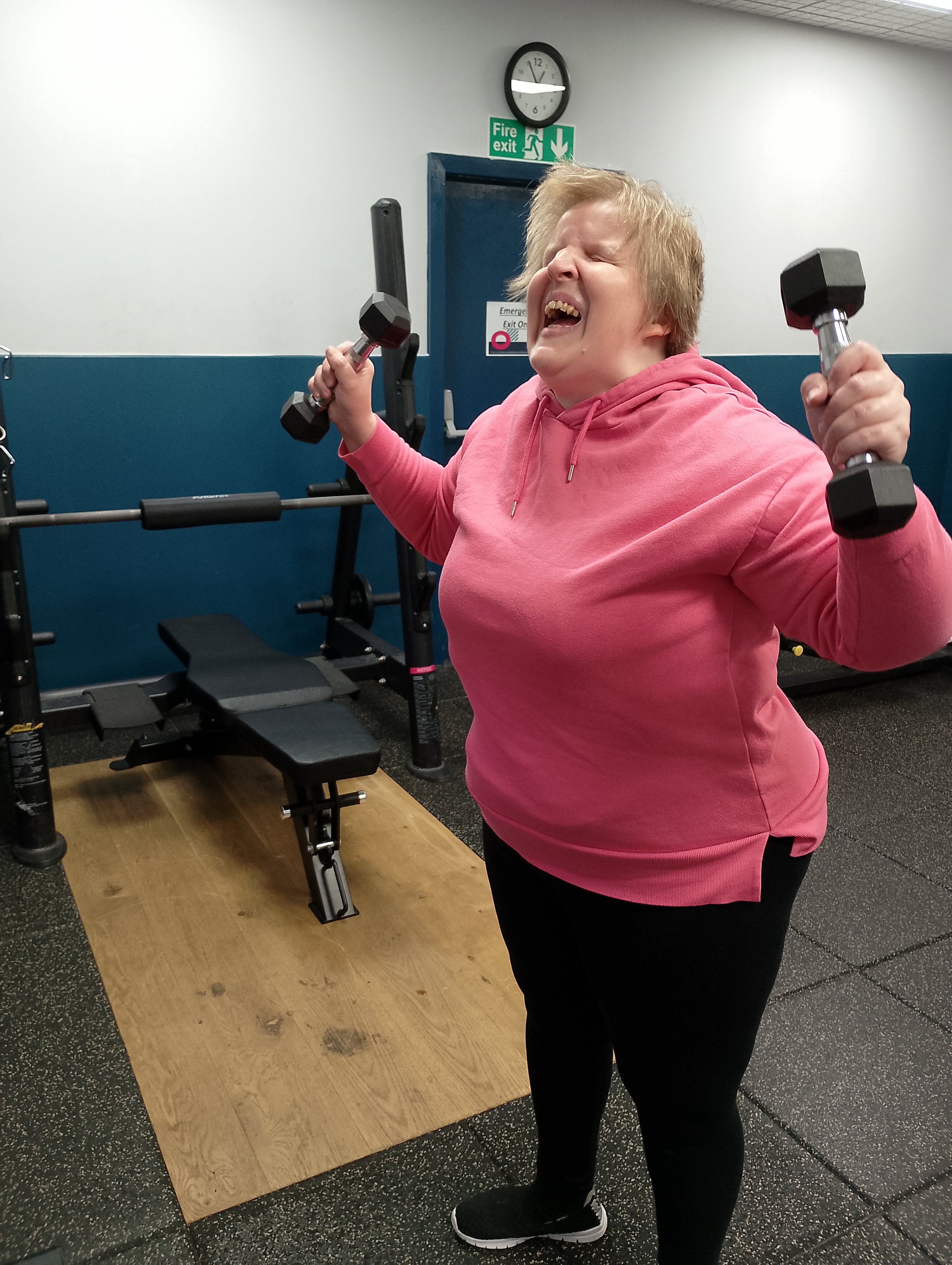 Working out with weights at the gym